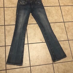 They are Women Rock Revival jeans that are a size 27